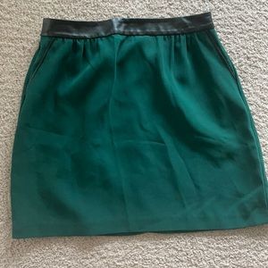 green zip up skirt size 8